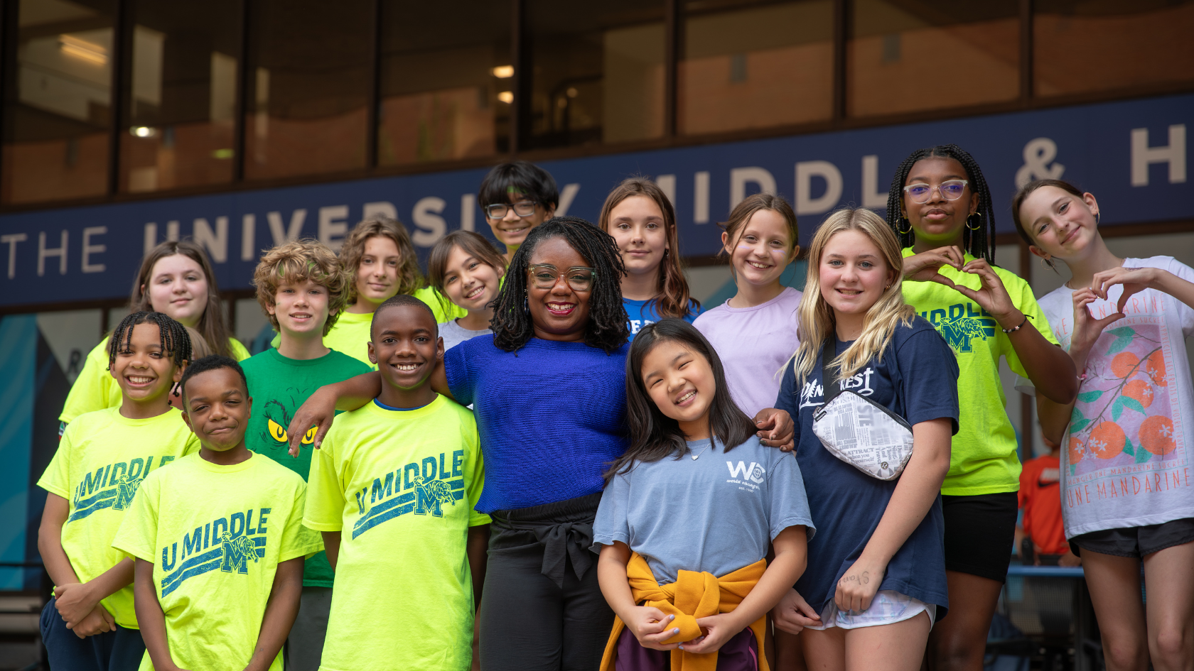 Group of University Middle School students smiling together