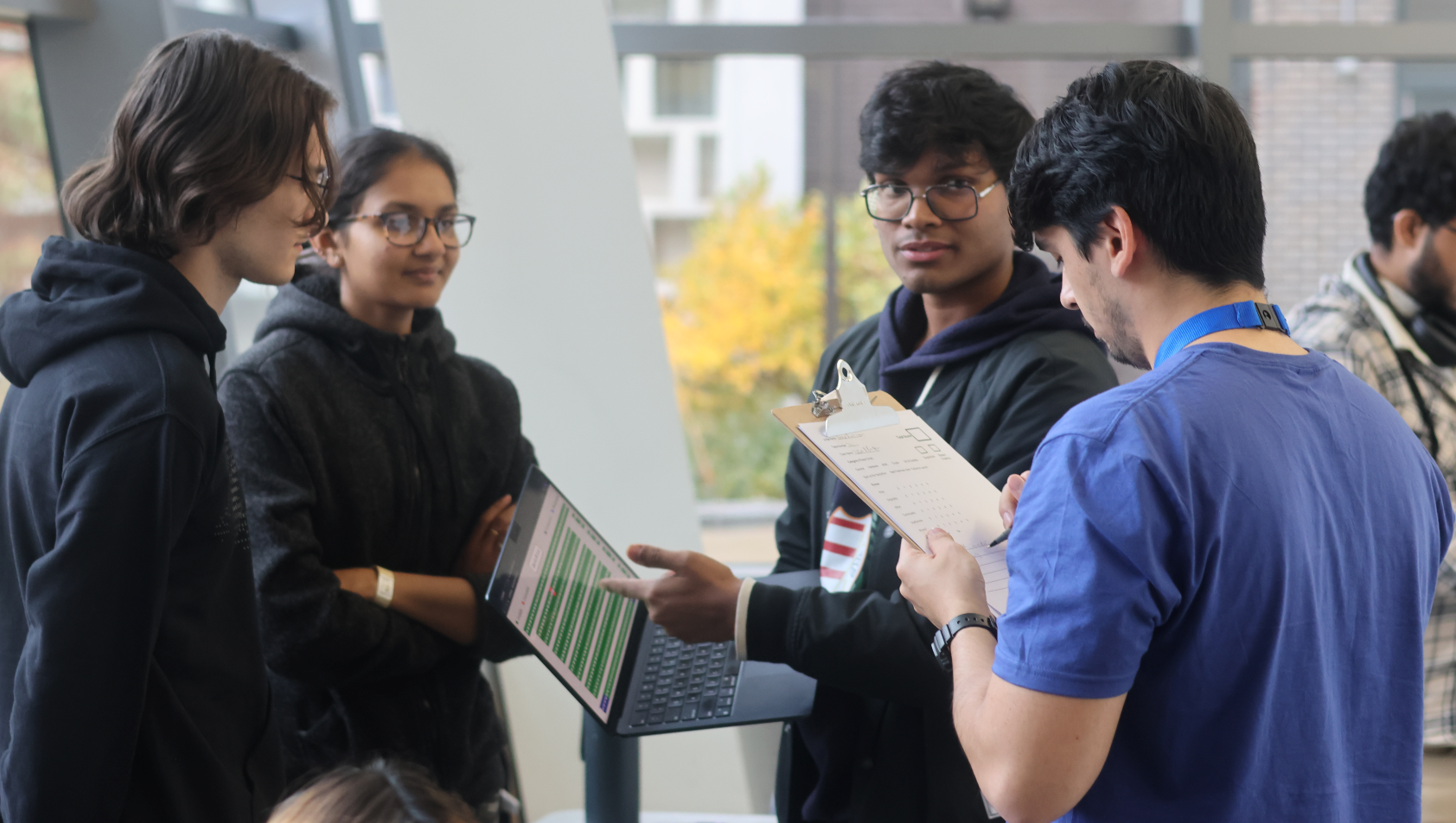 Students presenting their final project to judges