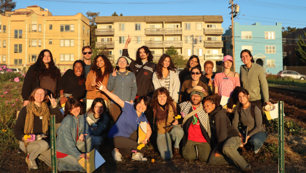 Group of students at the Oxford Tract Farm smiling