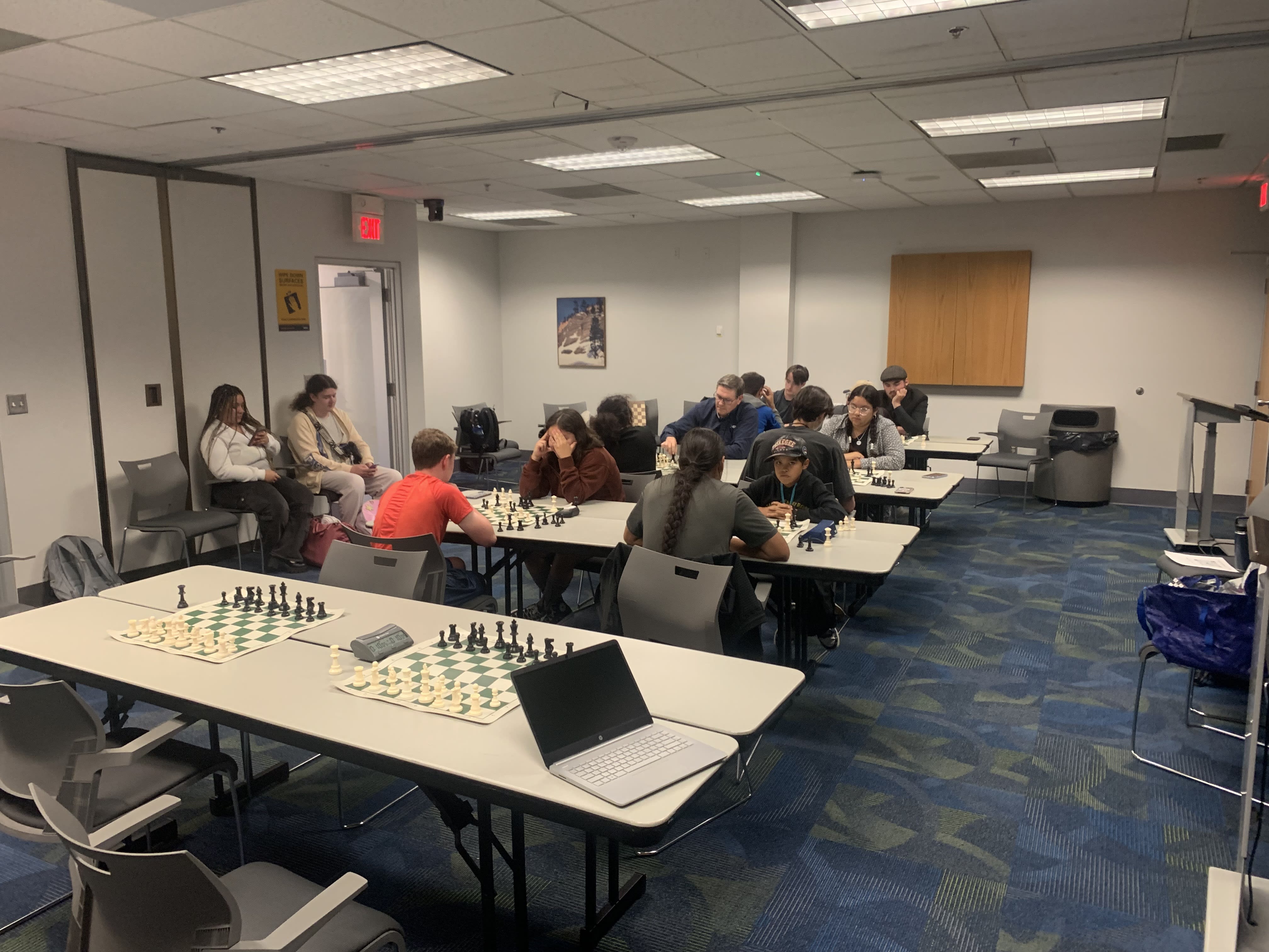 The players playing in the tournament hall!