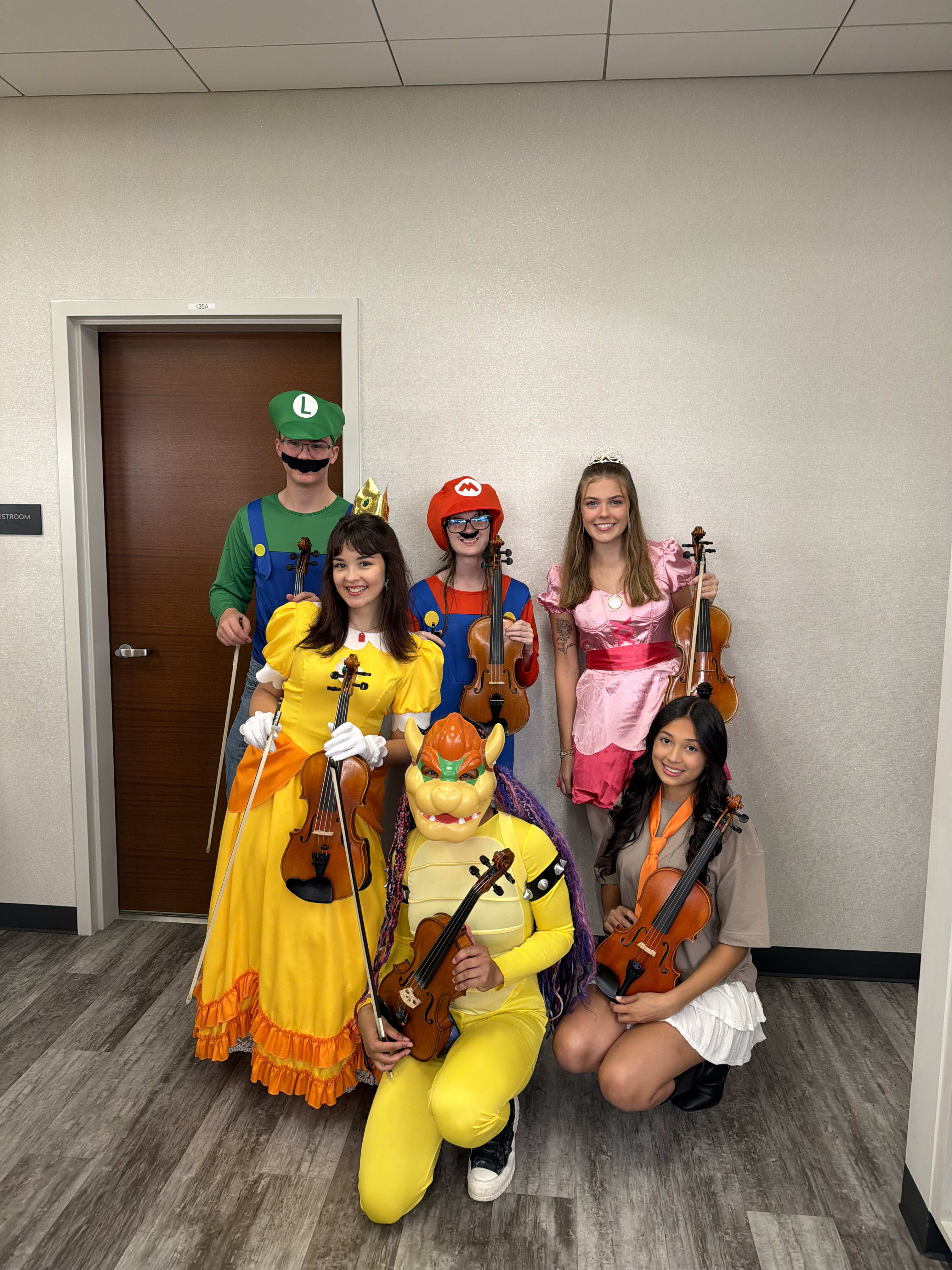 The Violin 2 Section in their Halloween Costumes