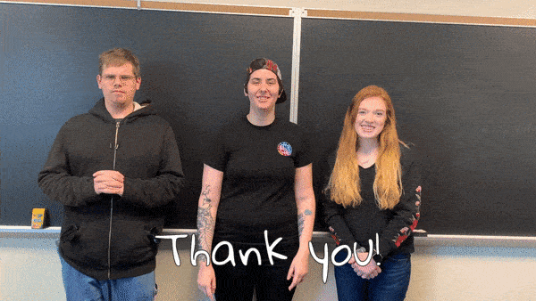 Three people with Thank you in front of blackboard