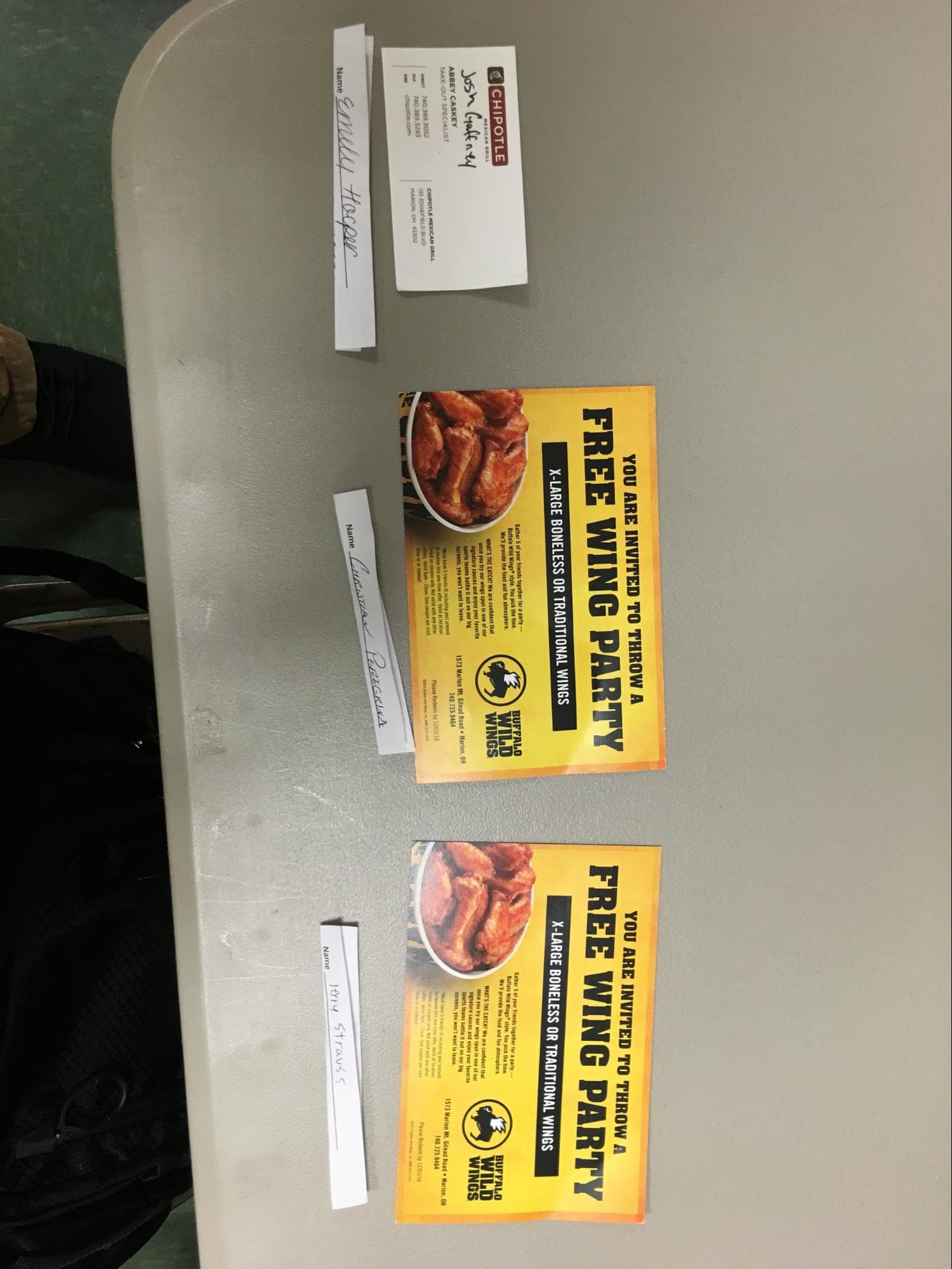Three Buffalo Wild Wings promotion cards