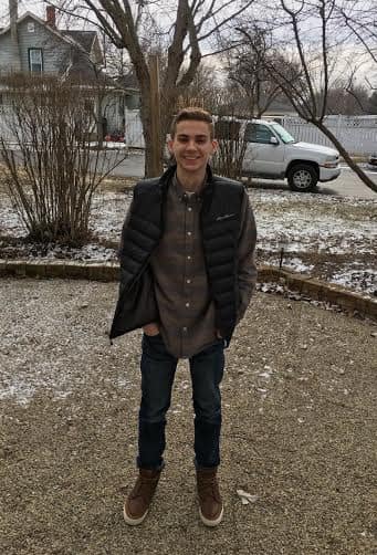 Zeb posed outside with snow covering the ground