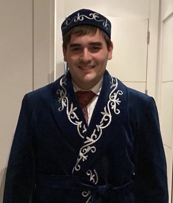 Tomas in a Kazakh jacket and hat