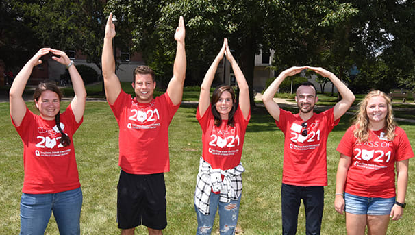 Five students in Class of 2021 t-shirts, outside