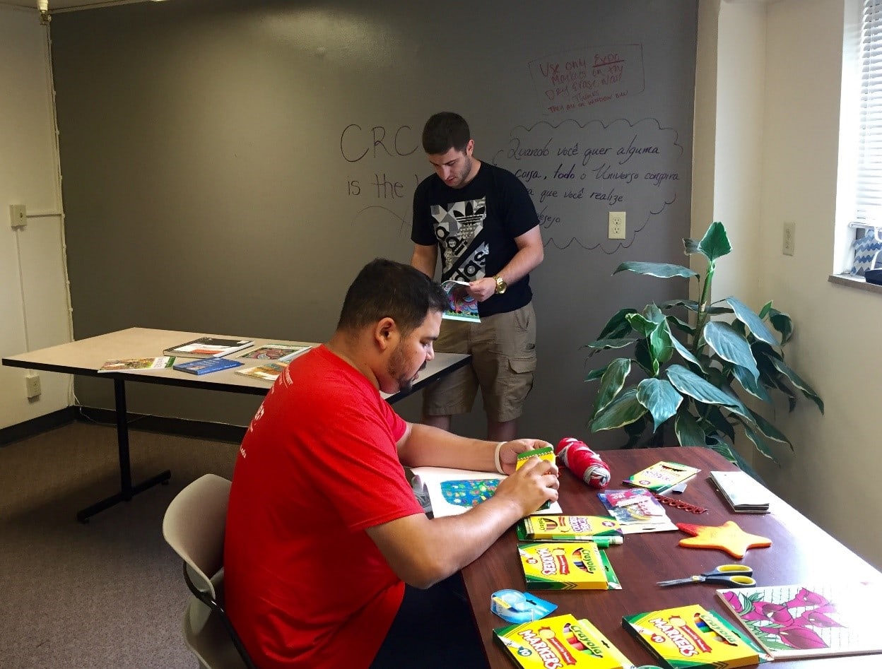 One students sets out markets, the other reading