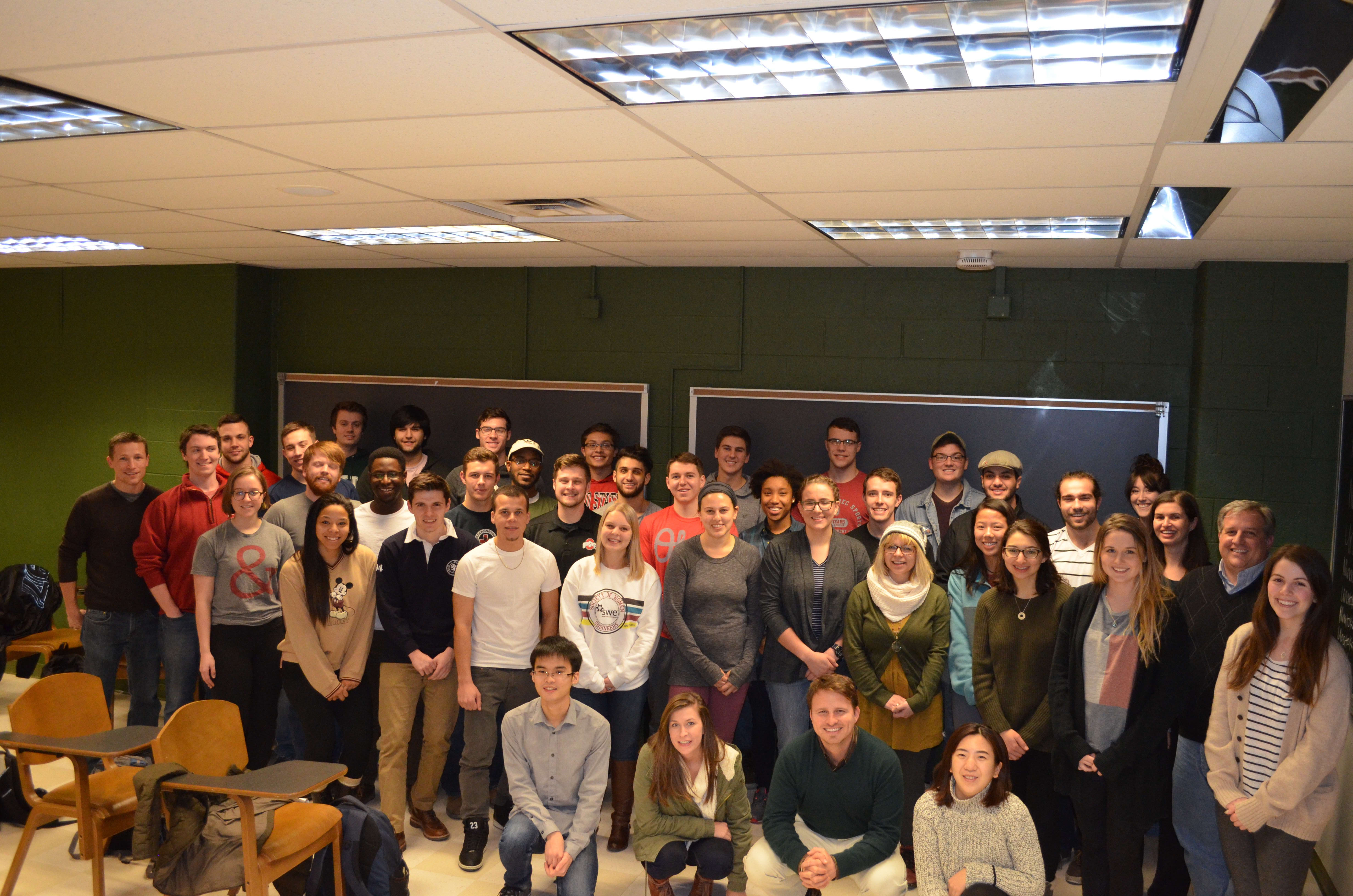 A large group of students and staff inside a class
