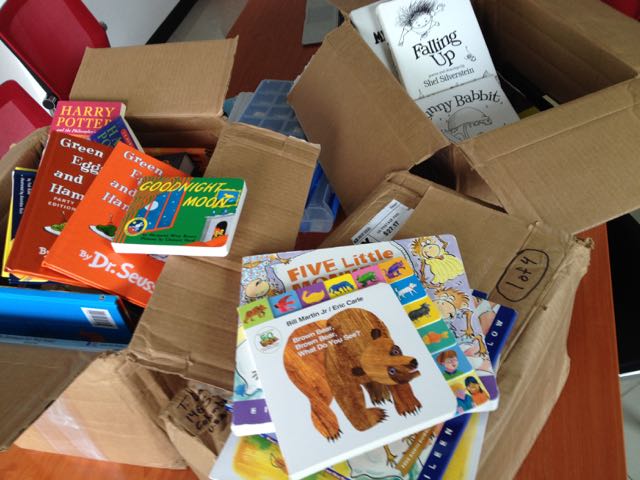 Cardboard boxes full of children's books
