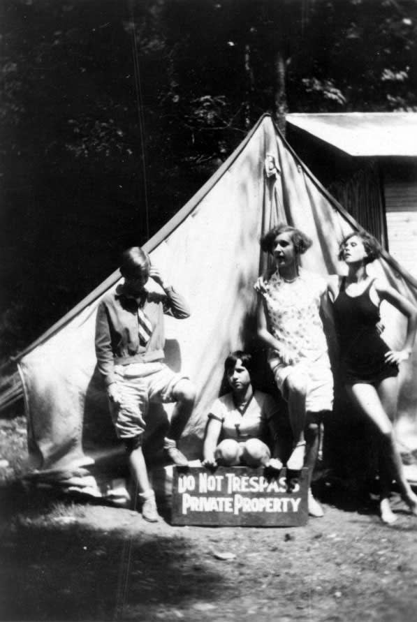 Four campers in 1929 behind a no trespass sign