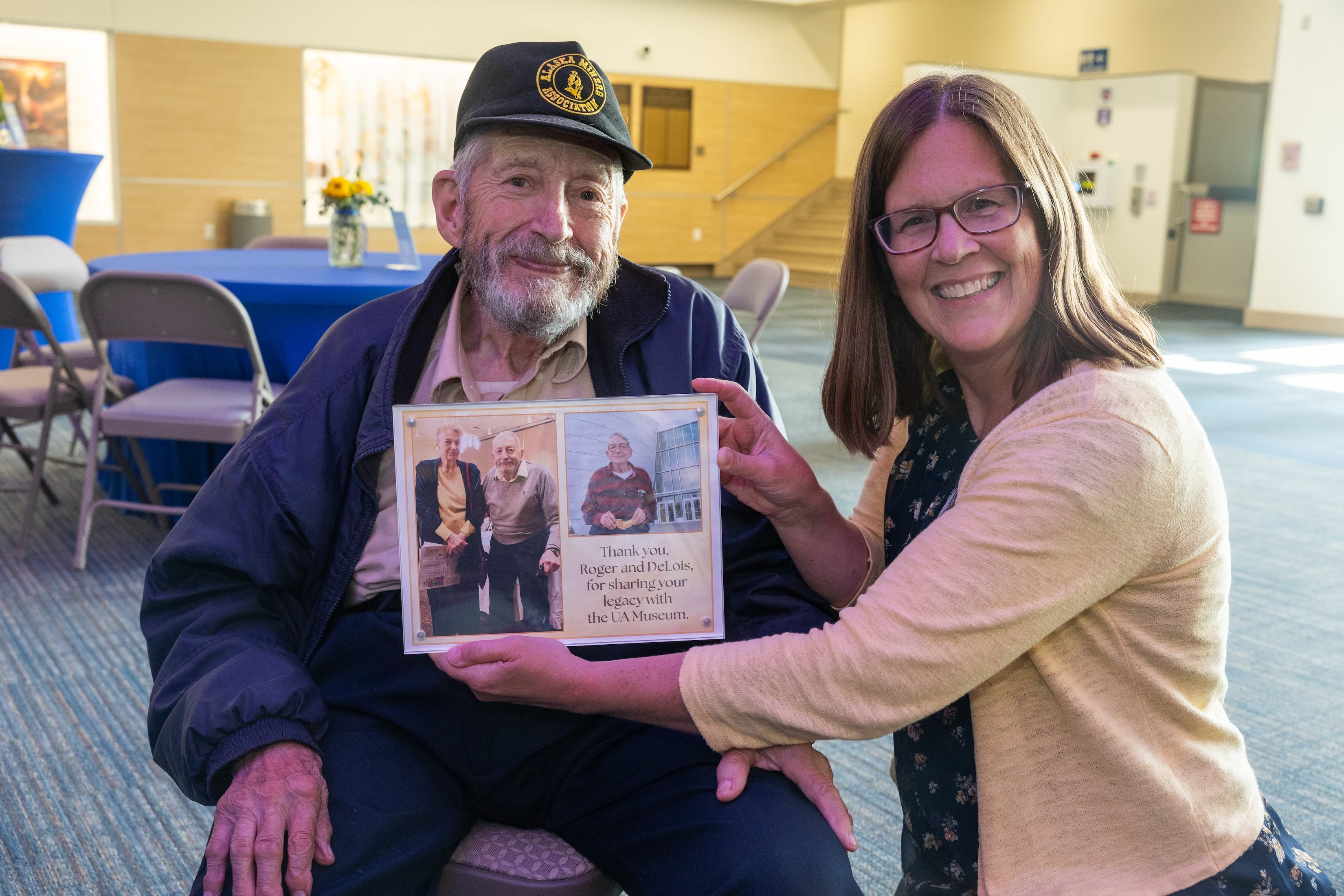 Roger receives a plaque recognizing his donation.