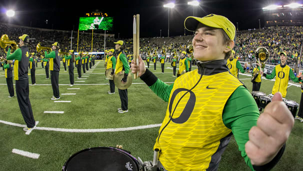 A smiling member of the drum line