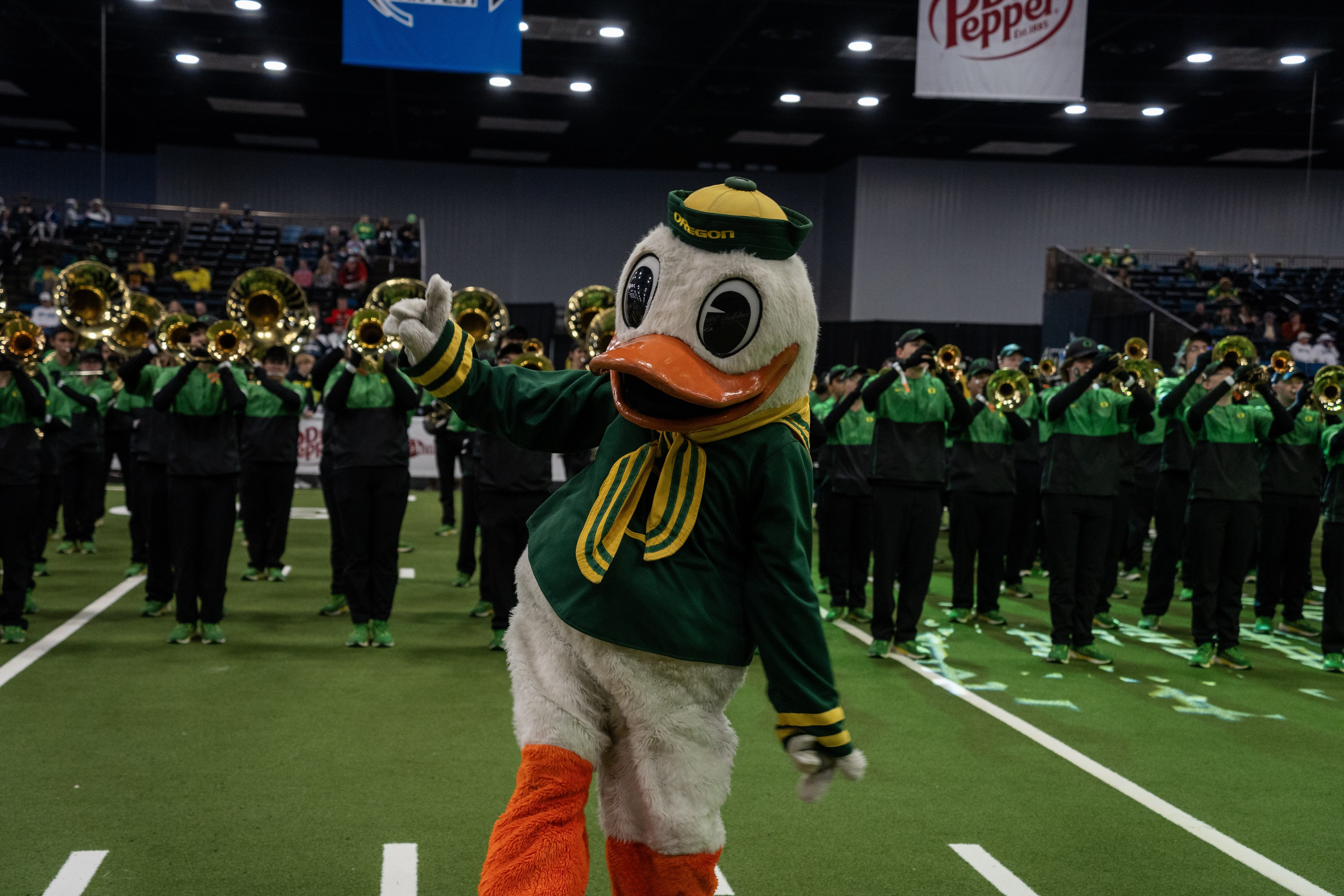 Marching band preforming with The Duck's support