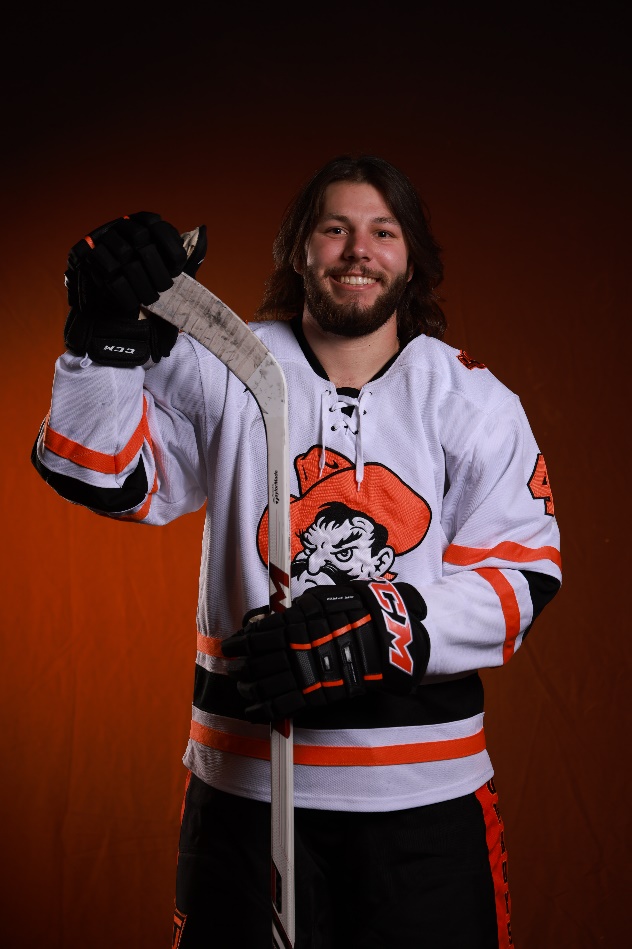 A person wearing a hockey uniform

Description automatically generated with low confidence