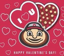 A Valentine's Day Card with Brutus Buckeye's head. Beneath it is written 'Happy Valentine's Day' in white coloring