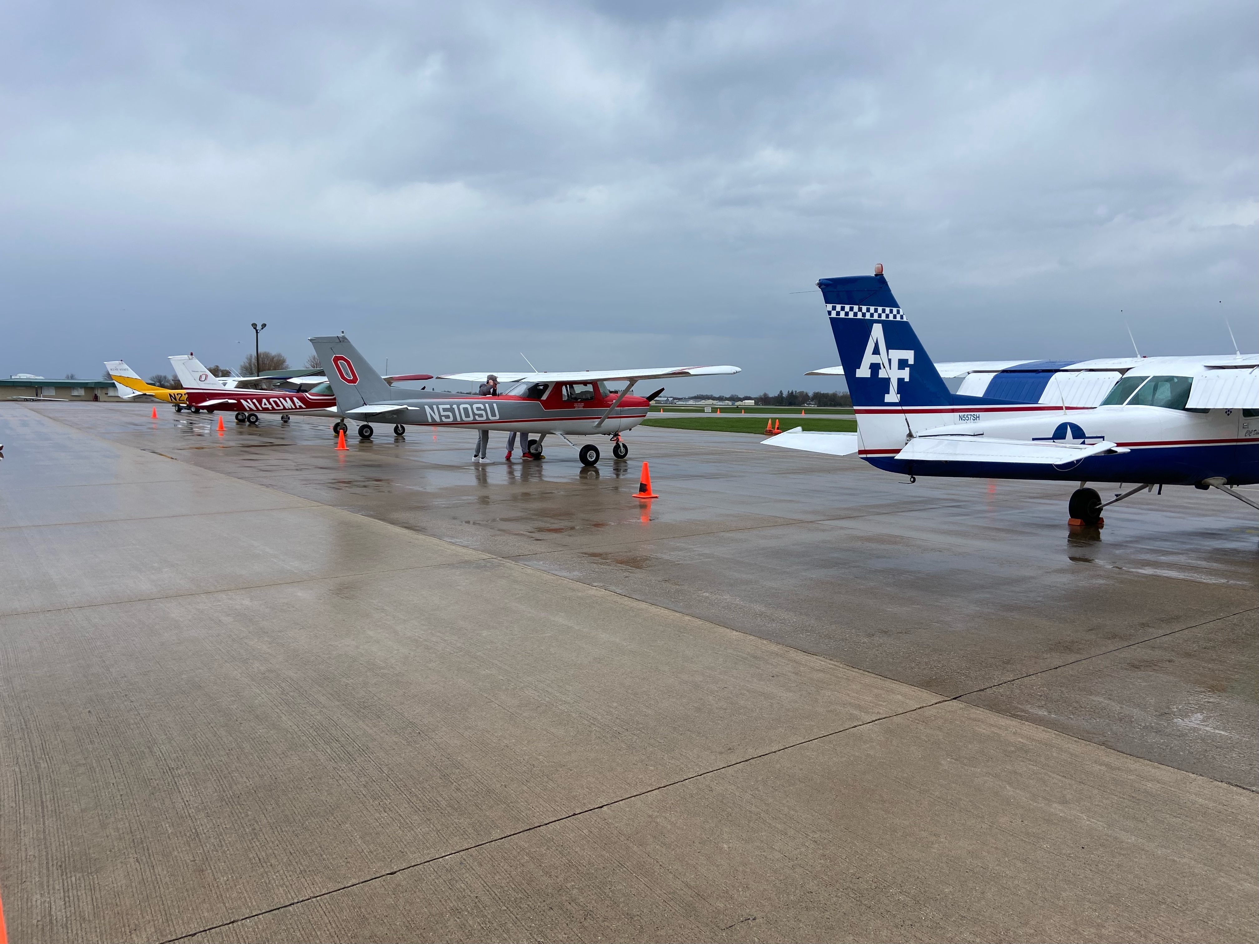 The Ohio State Flight Team lined up with other planes on the runway