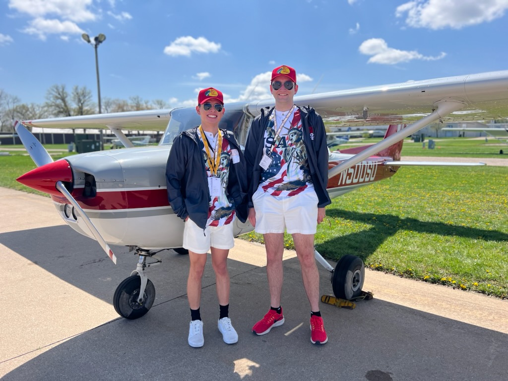 Two Ohio State Flight team members posed before the N51OSU plane