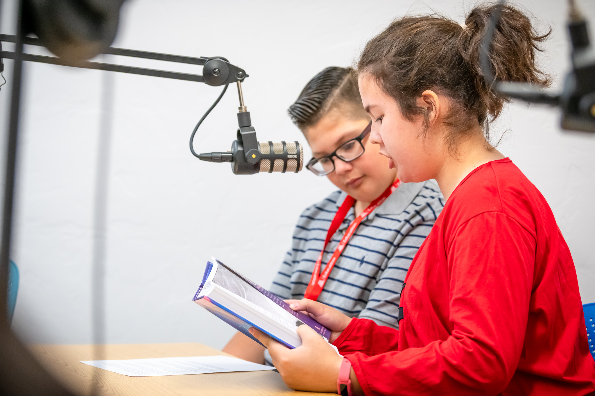 Two Reading Ambassadors at a mic