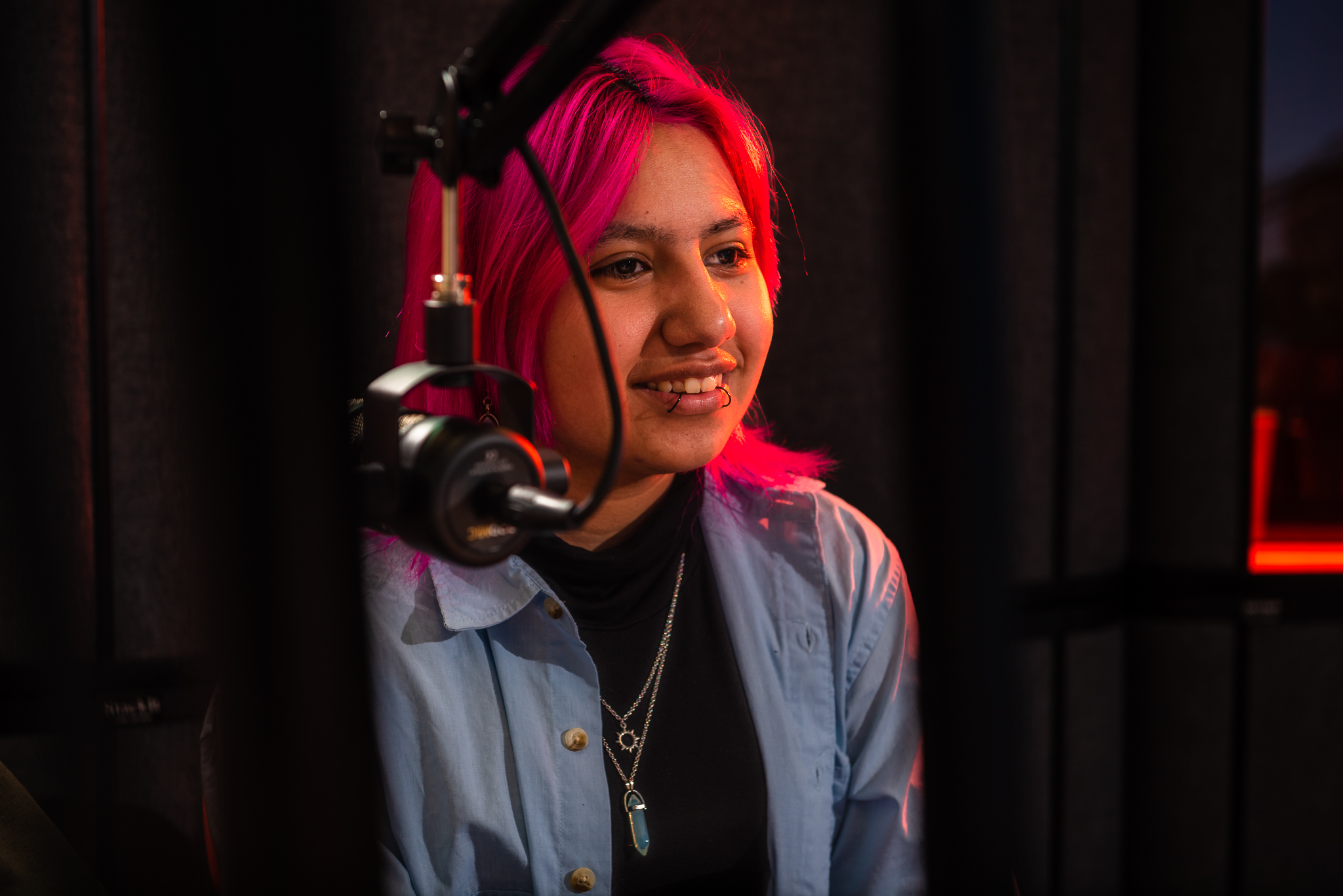 Reading Ambassador smiles into mic