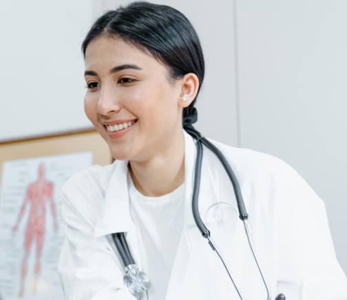 A doctor smiling