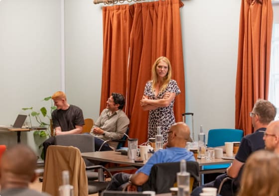 Members of the Scan.com team having a meeting