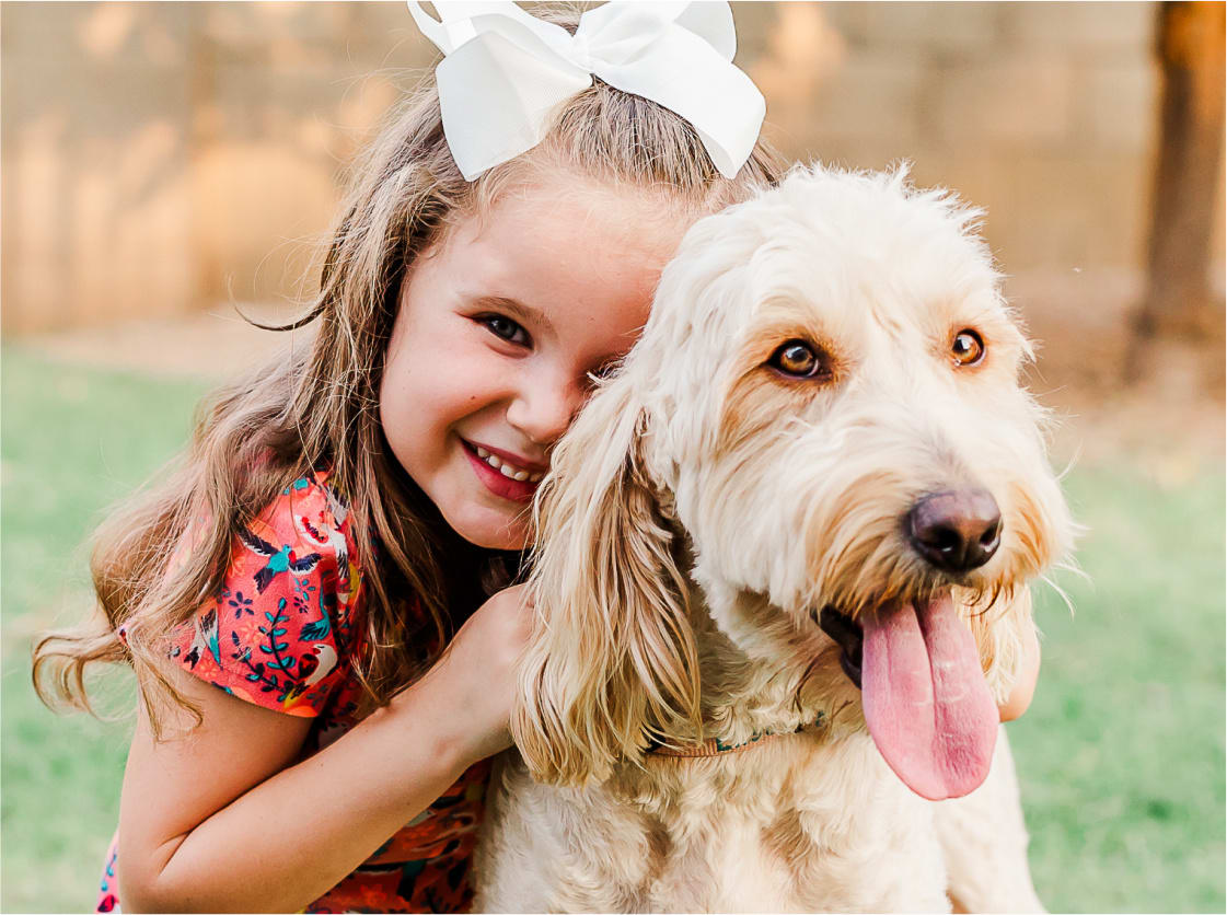 Family with Goldendoodle Puppy