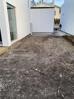 Hage langs husets vestside