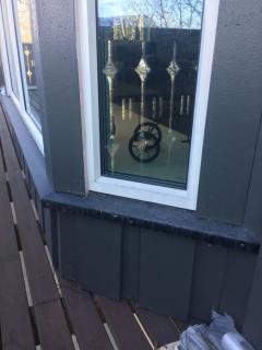 Nytt karnapp naboleilighet - forsterket ned pu00e5 terrasse