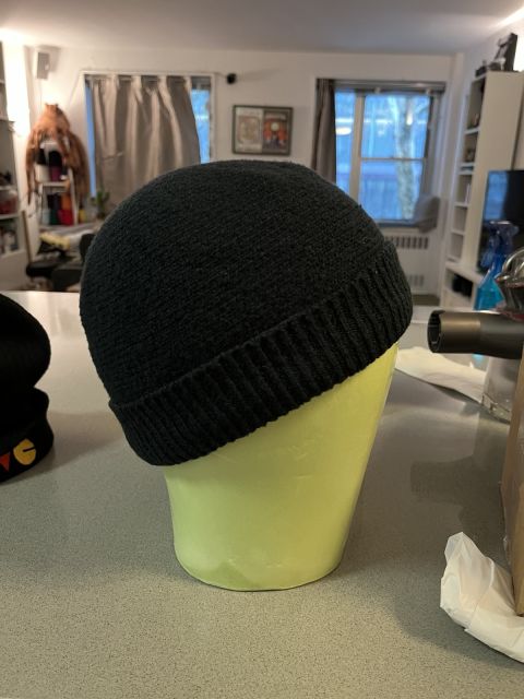 Right-facing view of the mannequin wearing the Black Chattie.