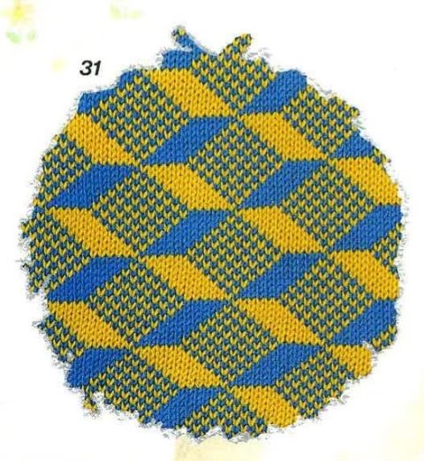 A tiling pattern of cubes in yellow and blue stitches numbered '31'.