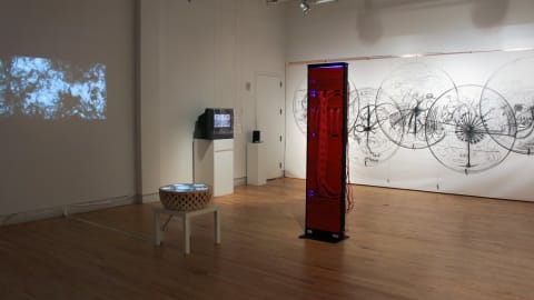 A gallery of paintings and installations