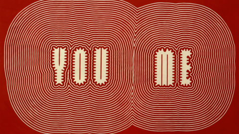 Stylized text artwork by Paula Scher in red and beige, "You Me," designed with a 'reverberating'-type effect around each word.