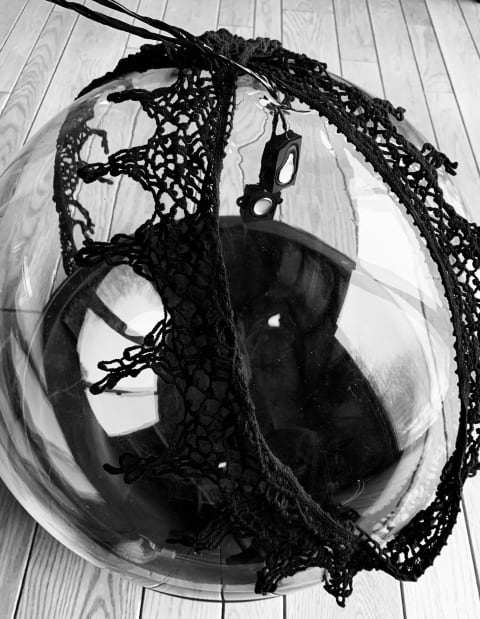 Black and white photograph detailing one item in the installation