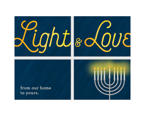 A greeting card with "Light & Love written across the top in script, and a menorah in the lower right hand side with all candles lit