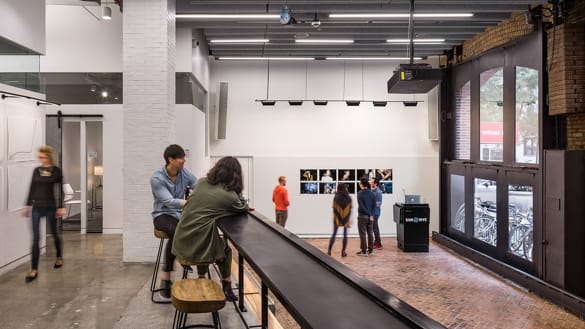 Students sitting in MFA Photo space.