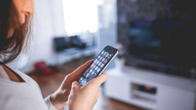 woman using iphone