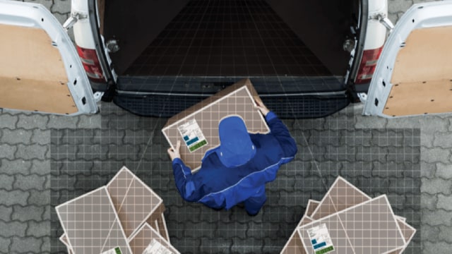 worker carring boxes