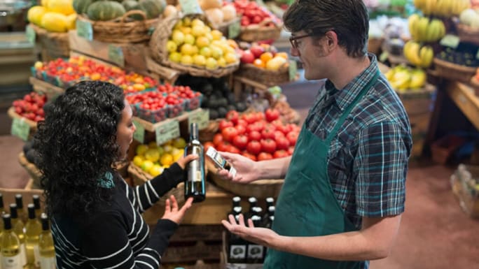 wine seller presenting his products