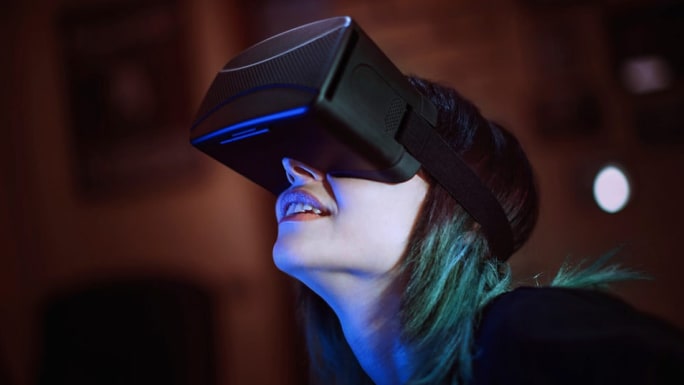 woman using VR headset
