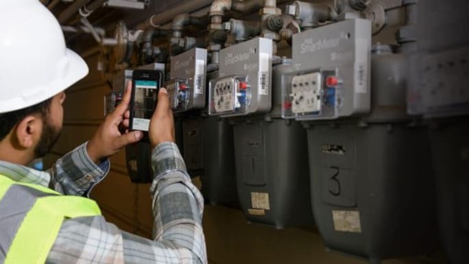 worker scanning barcodes