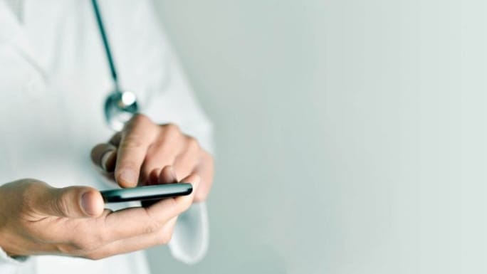 doctor using smartphone