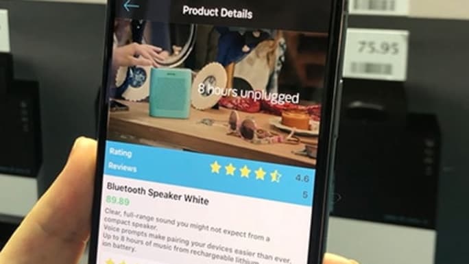 reading product reviews on smartphone