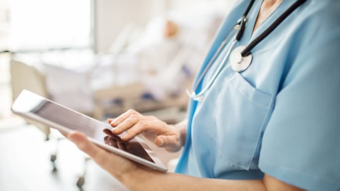 Nurse holding tablet
