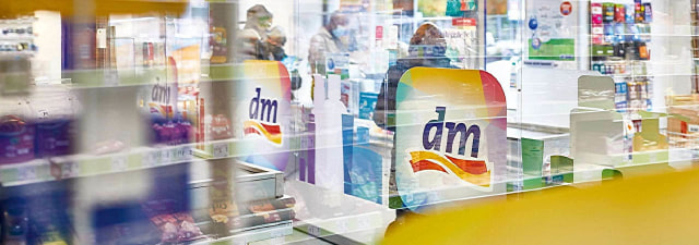 DM logo in store