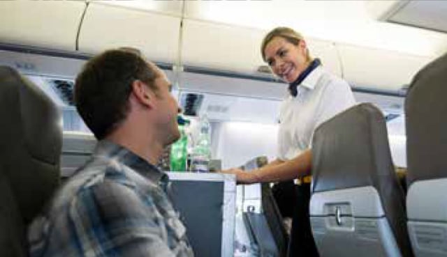 Stewardese serving customers