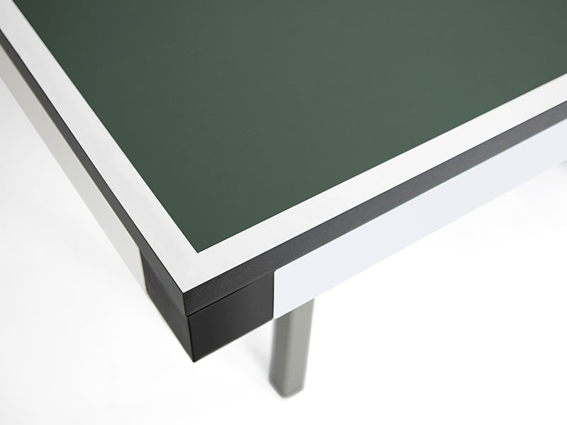 Close-up of the Whistler table's one-inch chipboard top