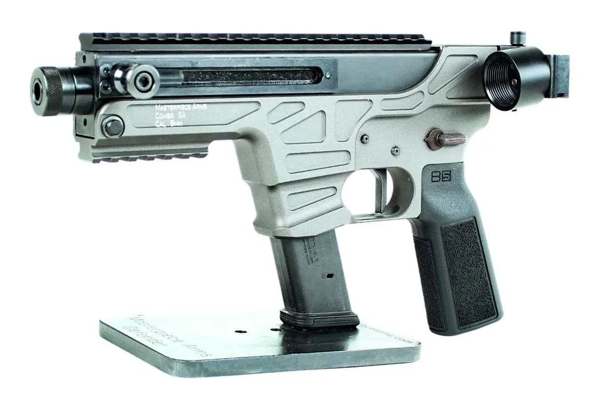 MASTERPIECE ARMS DEFENDER 30K 9MM PISTOL 4.5" T.B. SIDE COCKER, A2 GRIP, SIDE FOLD ASSEMBLY 1-34RD