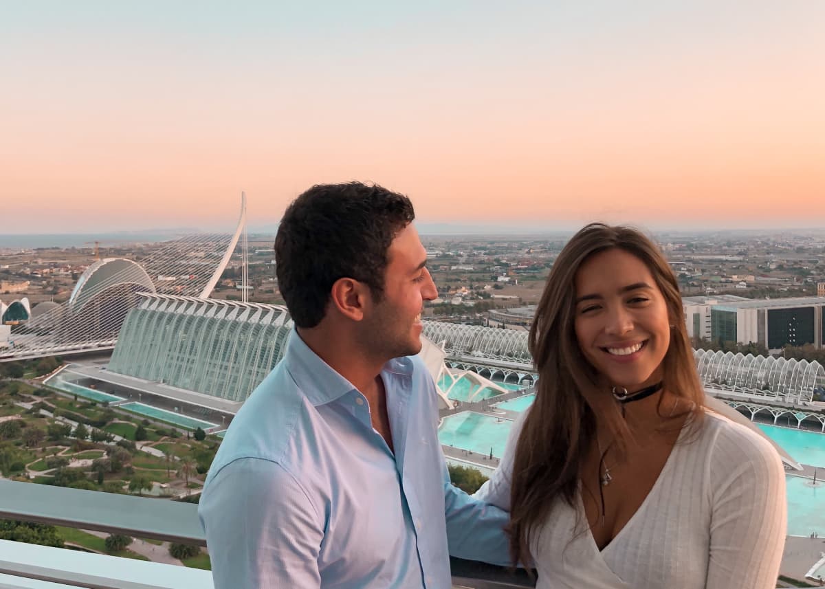 couple enjoying sunset over city of arts and sciences