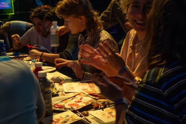 People planning a creative action.
