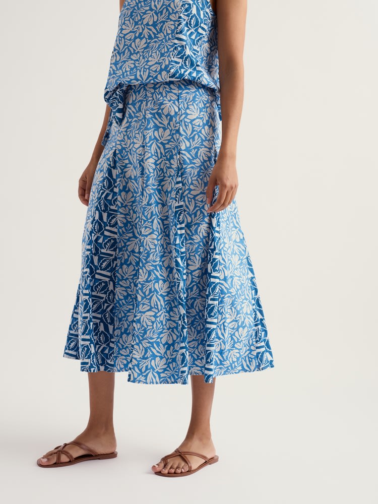 Model wearing a pinafore made from repurposed denim squares
